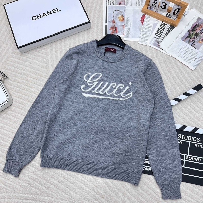 G*u*i sweaters